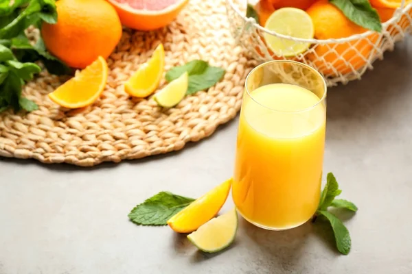 Glass of fresh orange juice on table — Stock Photo, Image