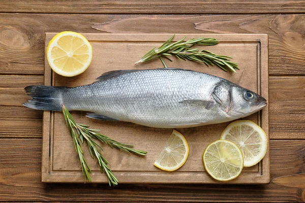 Fresh fish with rosemary — Stock Photo, Image