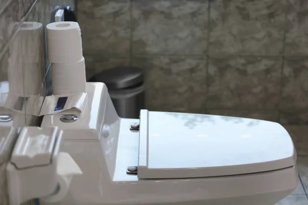 Toilet bowl in hotel restroom — Stock Photo, Image