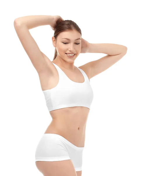 Mooie jonge vrouw in ondergoed op witte achtergrond. Dieet concept — Stockfoto