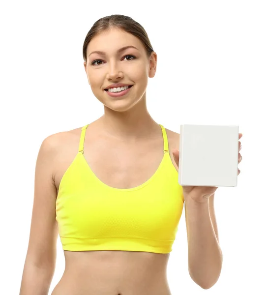 Krásná mladá žena s biologicky aktivní doplněk na bílém pozadí. Pojem dieta — Stock fotografie