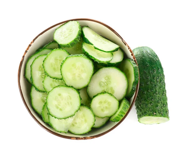 Bowl with sliced cucumber on white background — Stock Photo, Image