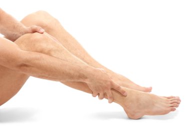 genç adam bacak ağrısı muzdarip