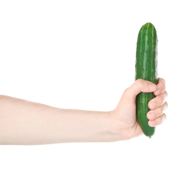 Mannelijke hand met komkommer op witte achtergrond. Seksuele potentie-concept — Stockfoto