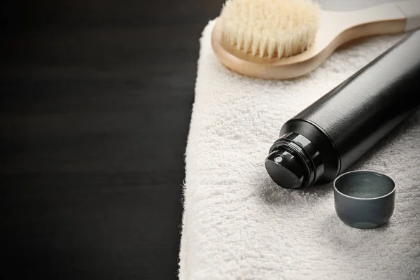 Set for personal care with deodorant on dark table — Stock Photo, Image