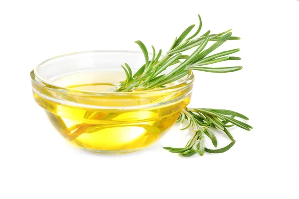 Bowl with rosemary oil and herb — Stock Photo, Image