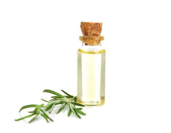 Botella con aceite de romero y hierba —  Fotos de Stock