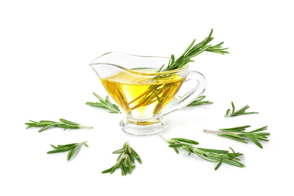 Gravy boat with rosemary oil and herb — Stock Photo, Image