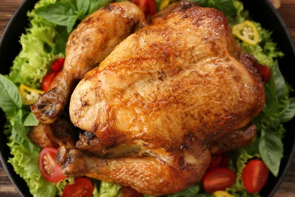 Plate with roasted turkey and vegetables on table — Stock Photo, Image