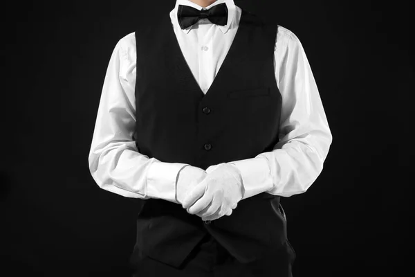 Man in white gloves on black background — Stock Photo, Image