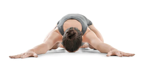 Yoga yaparken genç güzel kadın — Stok fotoğraf