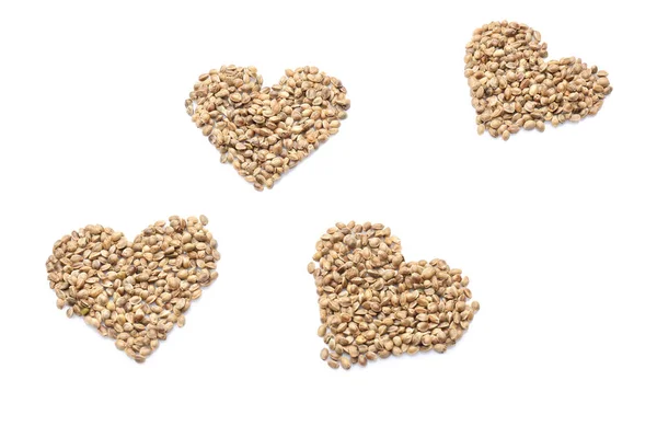 Hearts made of hemp seeds — Stock Photo, Image