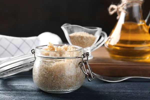 Cooked quinoa in glass jars — Stock Photo, Image