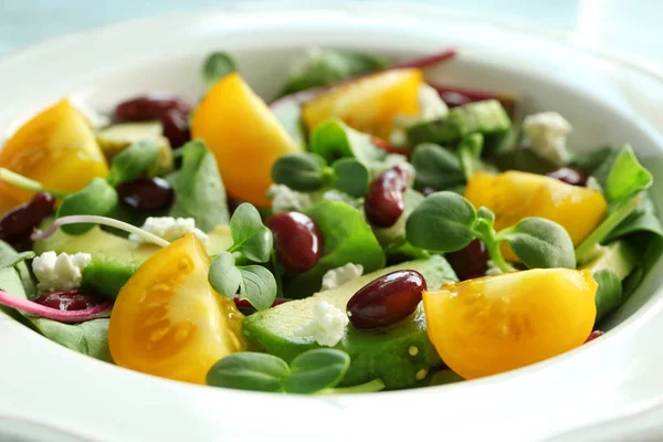 Salad with yellow tomato and zucchini — Stock Photo, Image