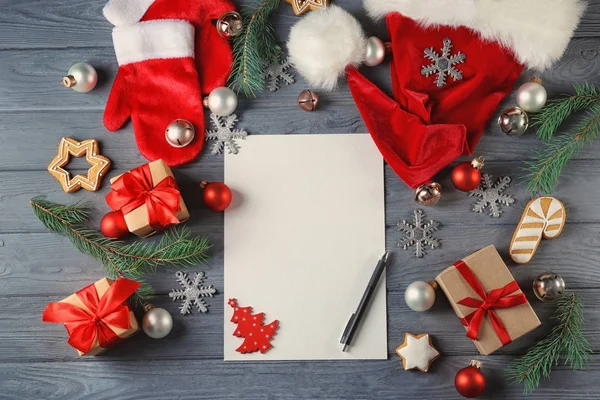 Composition with letter to Santa Claus on wooden table — Stock Photo, Image