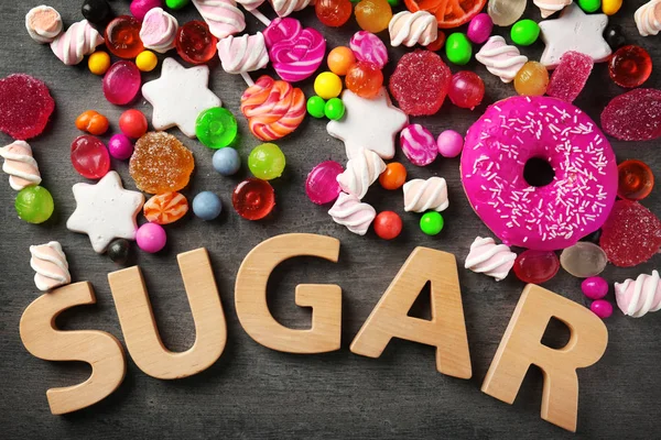 Composição de açúcar com variedade de doces — Fotografia de Stock
