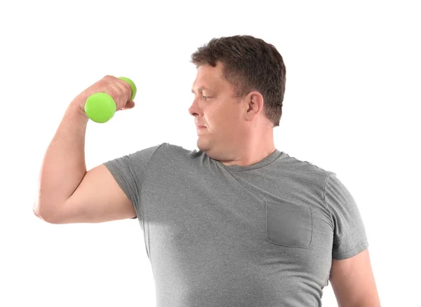 Overweight man with dumbbell on white background — Stock Photo, Image