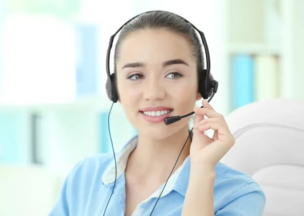 Young female technical support dispatcher working in office — Stock Photo, Image