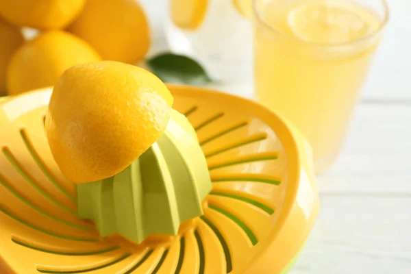 Lemon squeezer on table, closeup — Stock Photo, Image