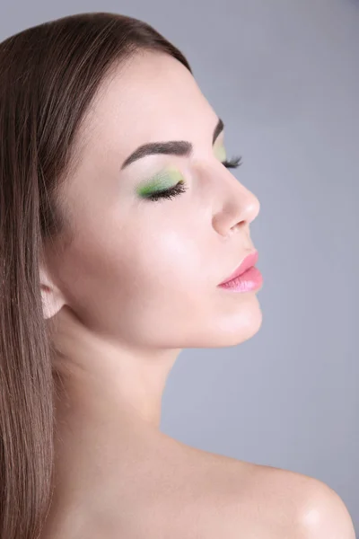Young beautiful woman with fancy makeup — Stock Photo, Image