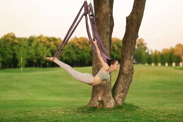 Woman practicing aerial yoga — Stock Photo, Image