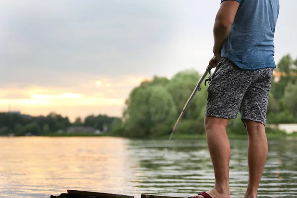 Man fishing on river — Stock Photo, Image