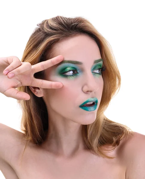 Jonge vrouw met heldere groene make-up — Stockfoto