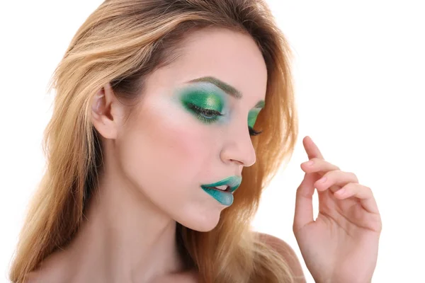 Молода жінка з яскраво-зеленим макіяжем — стокове фото