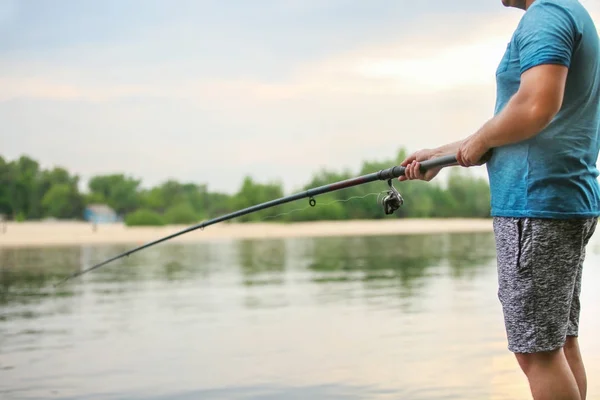 Man fishing on river — Stock Photo, Image