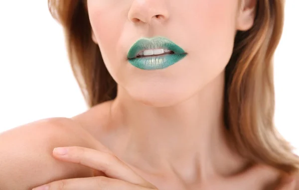 Ung kvinna med ljus grön makeup — Stockfoto