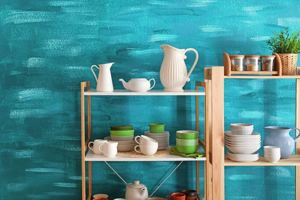 Kitchen shelving with dishes — Stock Photo, Image