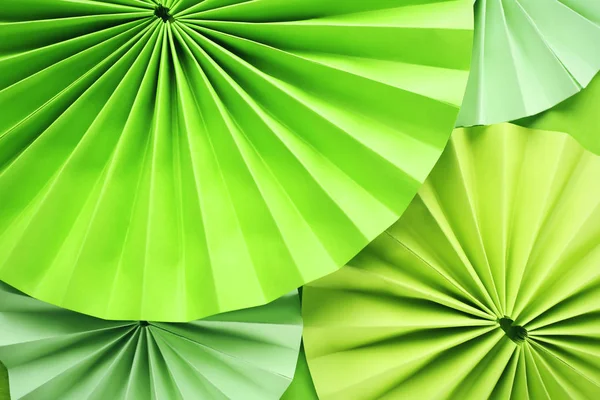 Hermosas decoraciones de papel verde como fondo — Foto de Stock