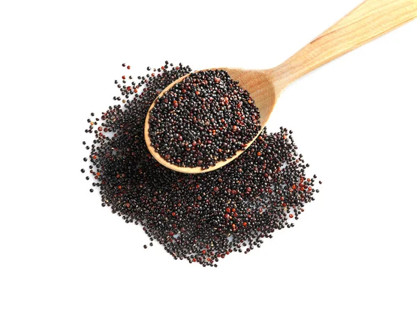 Spoon and black quinoa grains — Stock Photo, Image