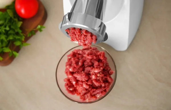Meat grinder with fresh forcemeat — Stock Photo, Image