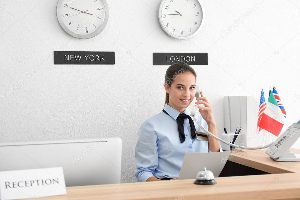 Female receptionist working in hotel