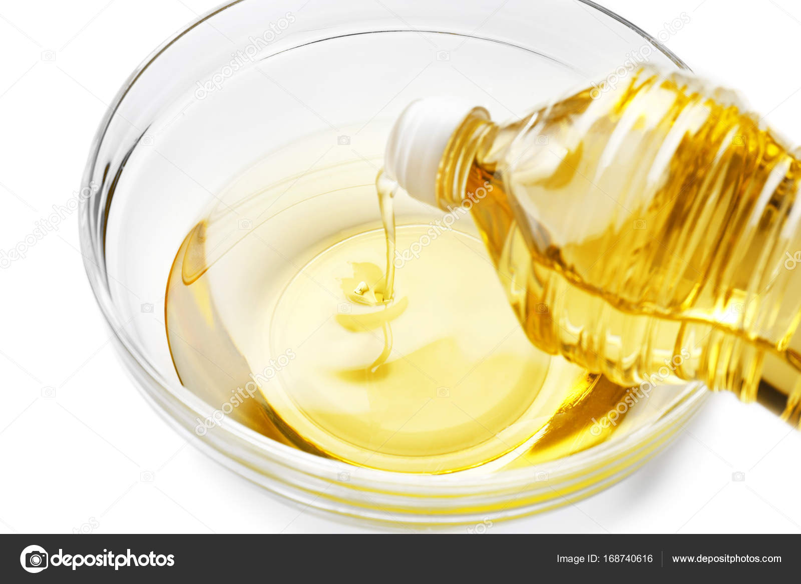 Pouring cooking oil Stock Photo by ©belchonock 168740616