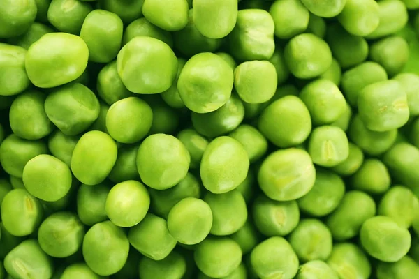 Guisantes verdes frescos como fondo — Foto de Stock