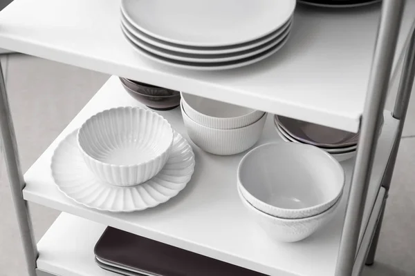 Tableware in shelving cart — Stock Photo, Image