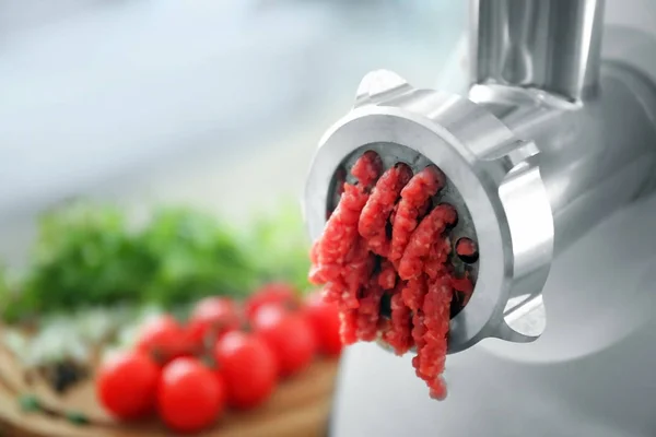 Meat grinder with fresh forcemeat