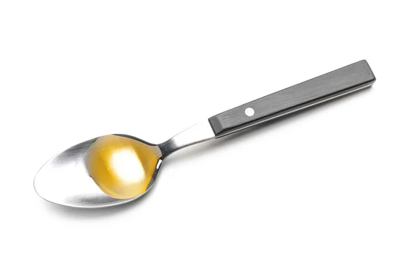 Cucchiaio con olio da cucina — Foto Stock
