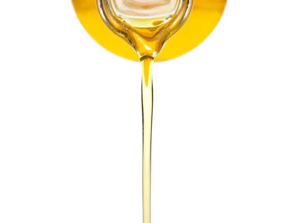 Pouring cooking oil — Stock Photo, Image