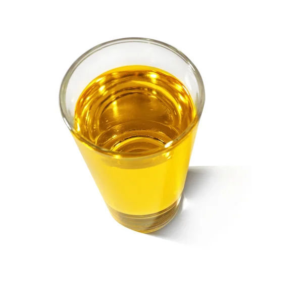 Vidrio con aceite de cocina —  Fotos de Stock