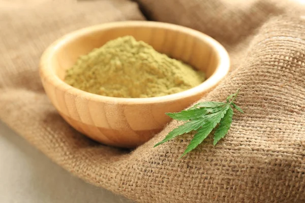 Hemp protein in wooden bowl — Stock Photo, Image