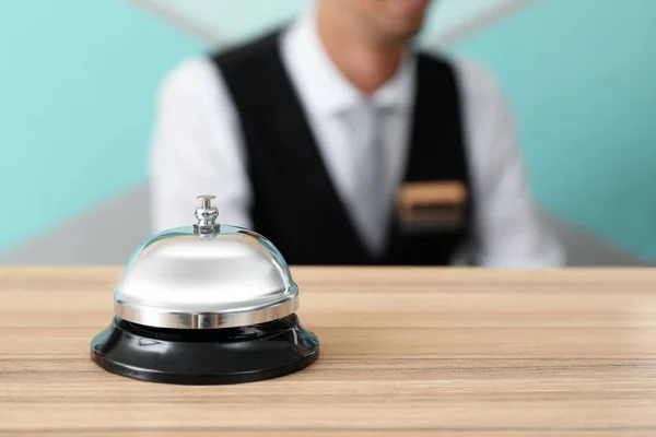 Silver service bell on reception desk in hotel — Stock Photo, Image