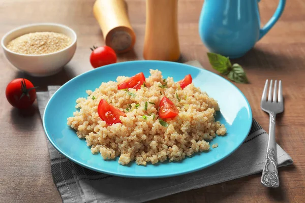 Plate with boiled quinoa grains — Stock Photo, Image