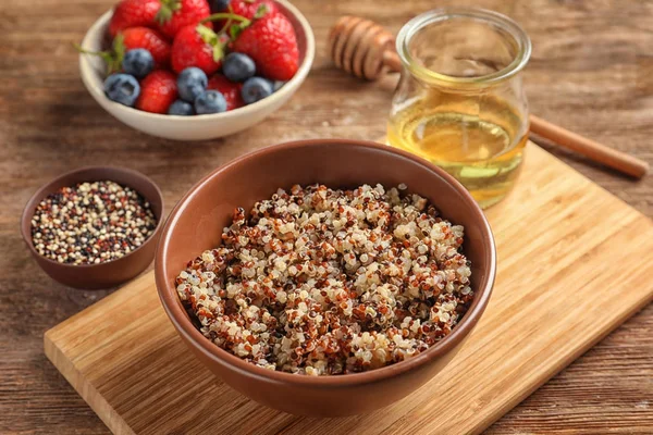 Bowl with tasty quinoa — Stock Photo, Image