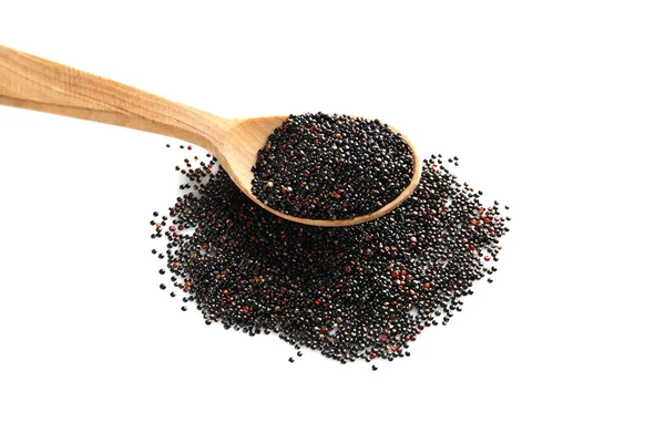 Spoon and black quinoa grains — Stock Photo, Image