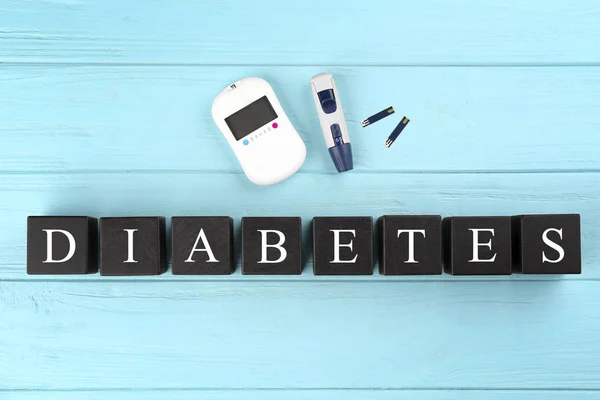 Komposisi dengan glucometer dan kata Diabetes — Stok Foto