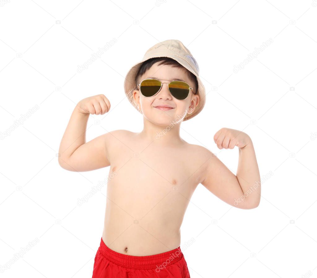 Cute little boy on white background. Summer vacation concept