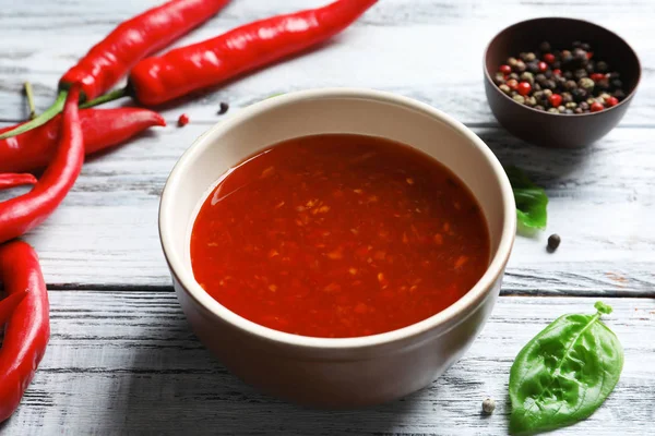 Ceramic bowl with chili sauce — Stock Photo, Image